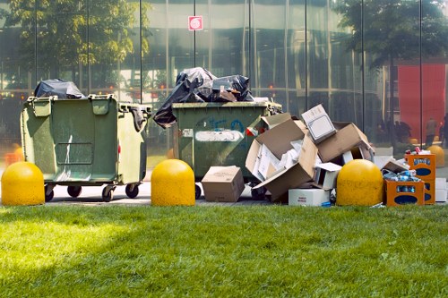 Workers managing construction debris